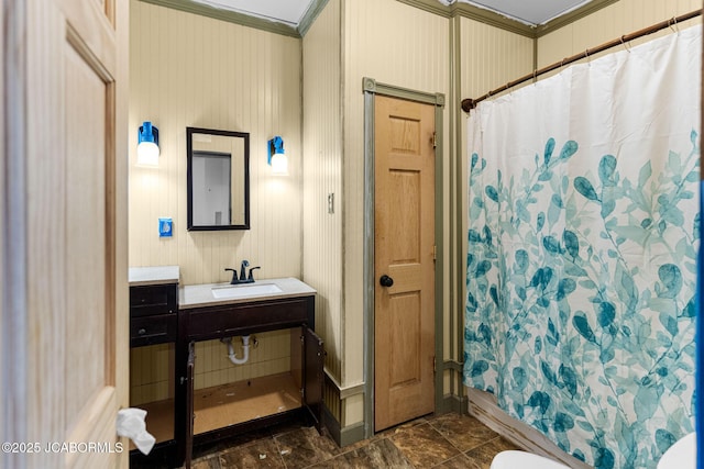 bathroom featuring toilet, ornamental molding, vanity, and a shower with curtain