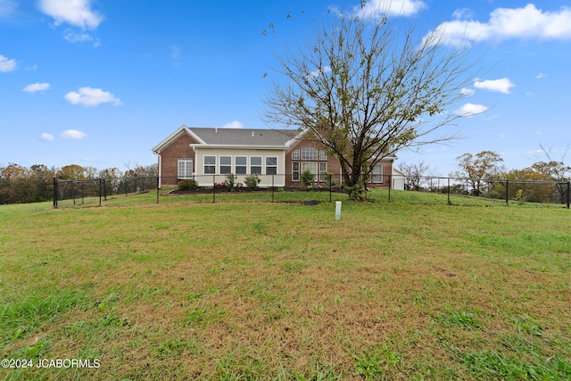 exterior space featuring a lawn