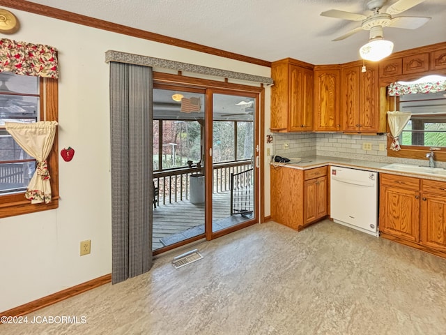 kitchen featuring tasteful backsplash, ornamental molding, ceiling fan, sink, and dishwasher