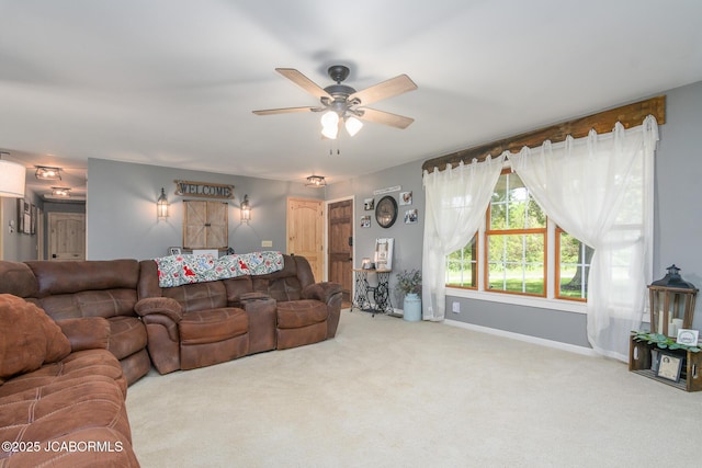 3609 Shamrock Rd, Jefferson City, MO 65101 - carpeted living area with ceiling fan and baseboards