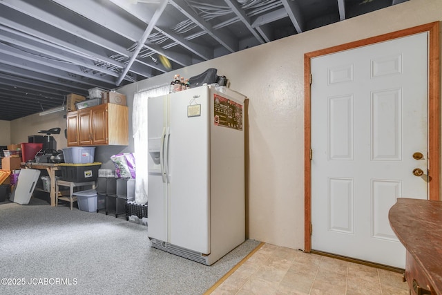 3609 Shamrock Rd, Jefferson City, MO 65101 - finished below grade area featuring white fridge with ice dispenser