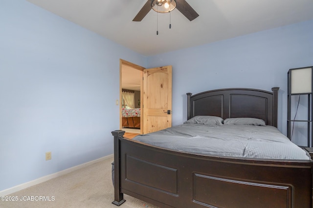 3609 Shamrock Rd, Jefferson City, MO 65101 - bedroom with light colored carpet and a ceiling fan