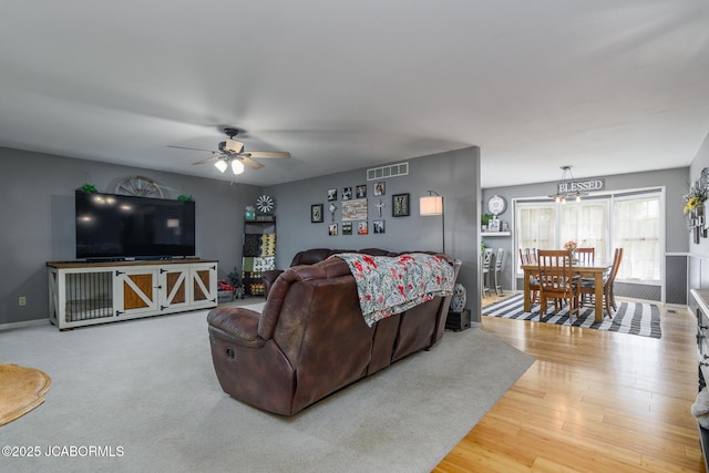3609 Shamrock Rd, Jefferson City, MO 65101 - living area with a ceiling fan and wood finished floors