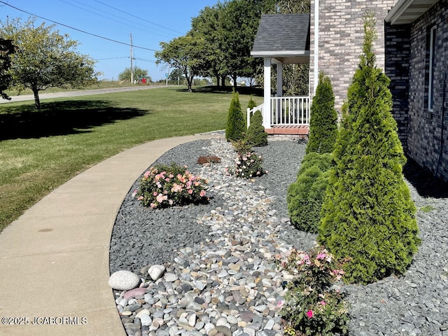 view of yard featuring a porch