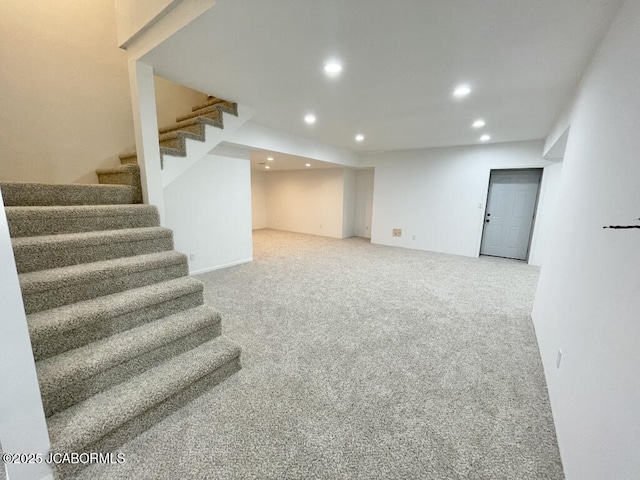 basement with carpet flooring