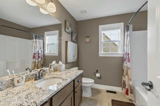 full bathroom with toilet, visible vents, vanity, and baseboards