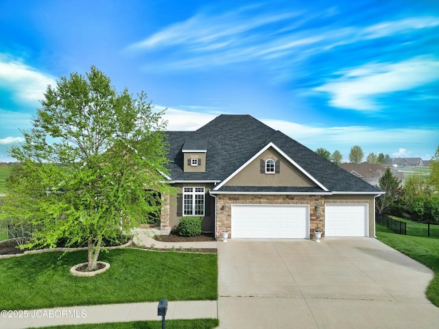craftsman inspired home with a front yard, stucco siding, driveway, stone siding, and an attached garage