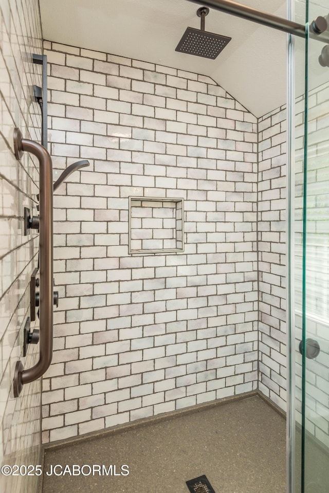 7515 Rte M, Jefferson City, MO 65101 - full bathroom with a shower stall and lofted ceiling
