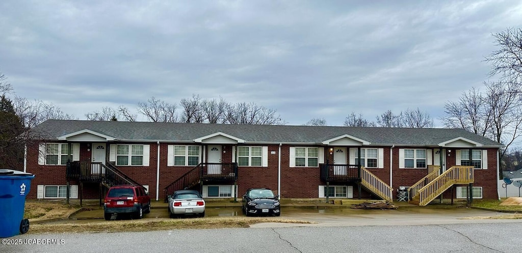 view of front of home featuring brick siding