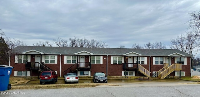 view of front of home featuring brick siding