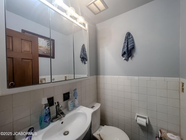 3674 State Rd, Aa, Holts Summit, MO 65043 - bathroom with a sink and tile walls