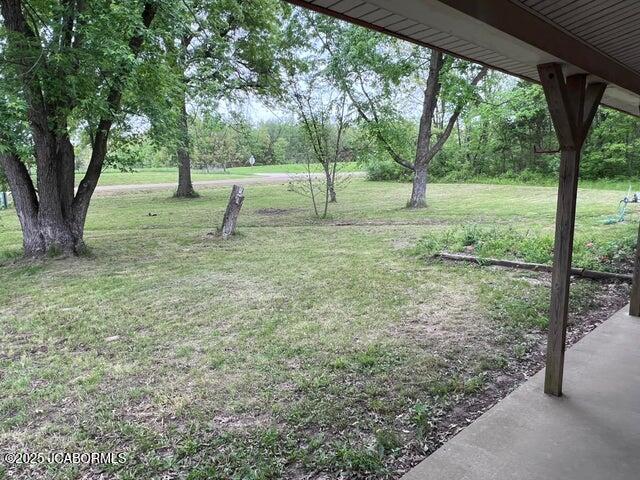 5888 State Rd E, Auxvasse, MO 65231 - view of green lawn