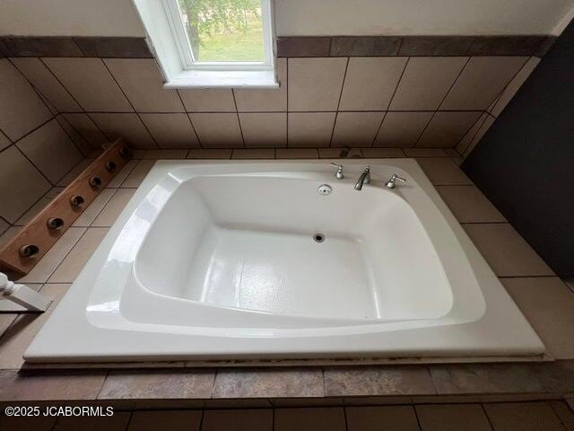 full bath with a tub to relax in