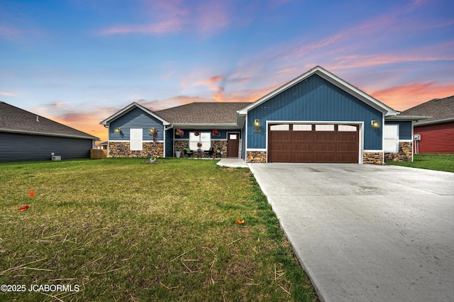15250 General Dr, Ashland, MO 65010 - craftsman-style home featuring concrete driveway, a front lawn, stone siding, and an attached garage