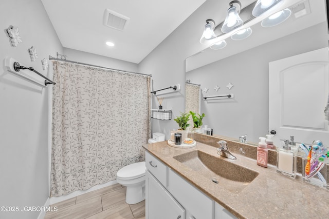 15250 General Dr, Ashland, MO 65010 - full bathroom featuring recessed lighting, vanity, curtained shower, toilet, and visible vents