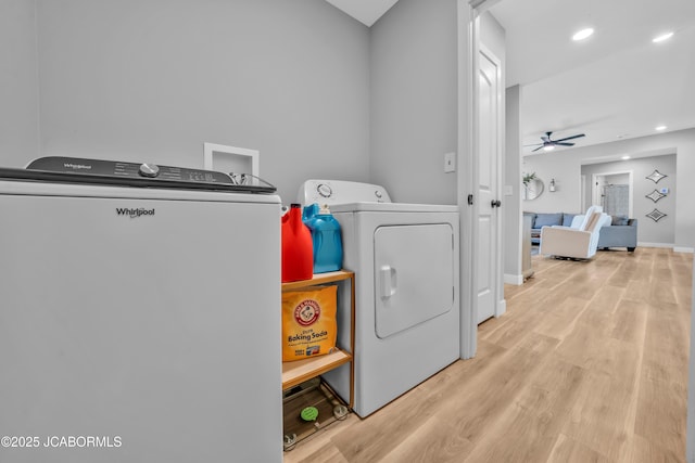 15250 General Dr, Ashland, MO 65010 - laundry room featuring ceiling fan, baseboards, separate washer and dryer, recessed lighting, and wood finished floors