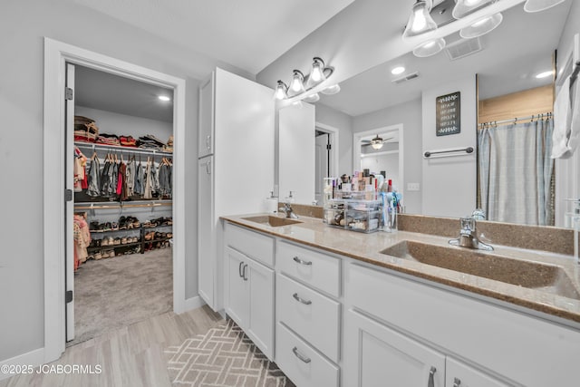 15250 General Dr, Ashland, MO 65010 - full bath with visible vents, ceiling fan, and a sink