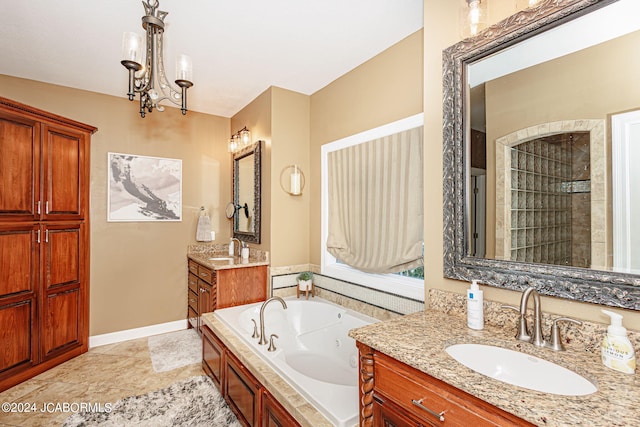 bathroom featuring vanity, independent shower and bath, and a chandelier