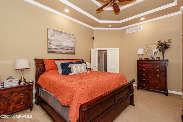 bedroom with ceiling fan, light colored carpet, and crown molding