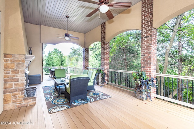 wooden terrace with ceiling fan