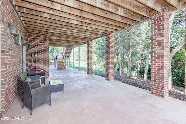 view of patio / terrace with stairway