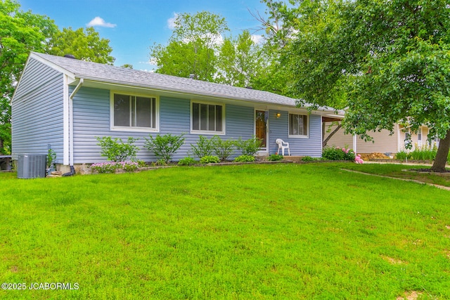 1924 Rolling Hills Dr, Jefferson City, MO 65109 - ranch-style house with cooling unit and a front yard