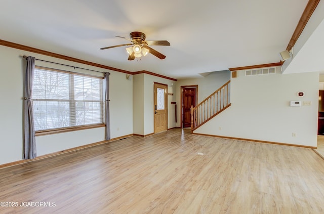 unfurnished living room featuring ceiling fan, light hardwood / wood-style flooring, and crown molding