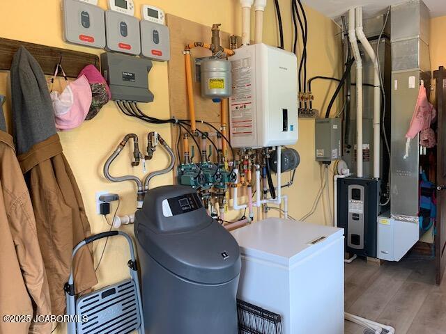 8596 County Rd 146, Williamsburg, MO 63388 - utilities featuring heating unit and tankless water heater
