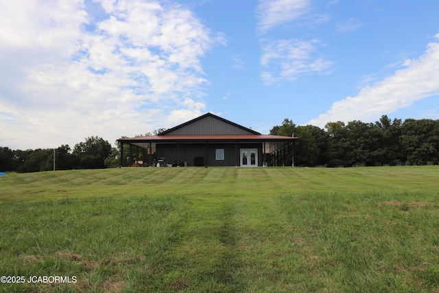 8596 County Rd 146, Williamsburg, MO 63388 - back of house with a lawn and french doors