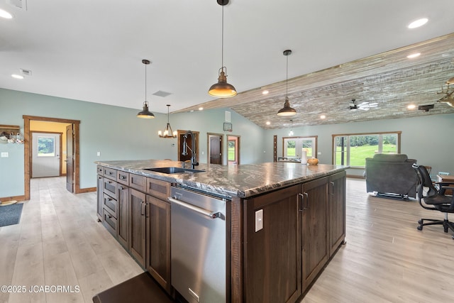 8596 County Rd 146, Williamsburg, MO 63388 - kitchen with stainless steel dishwasher, recessed lighting, light wood finished floors, and dark brown cabinets