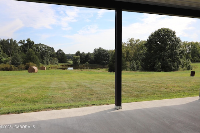 8596 County Rd 146, Williamsburg, MO 63388 - view of yard with a patio and a water view