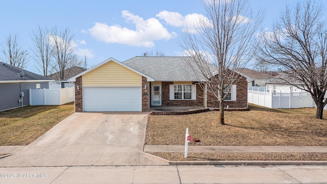 single story home with a garage, concrete driveway, brick siding, and fence