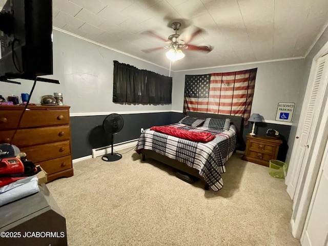 501 W Morgan St, Tipton, MO 65081 - carpeted bedroom with crown molding and ceiling fan