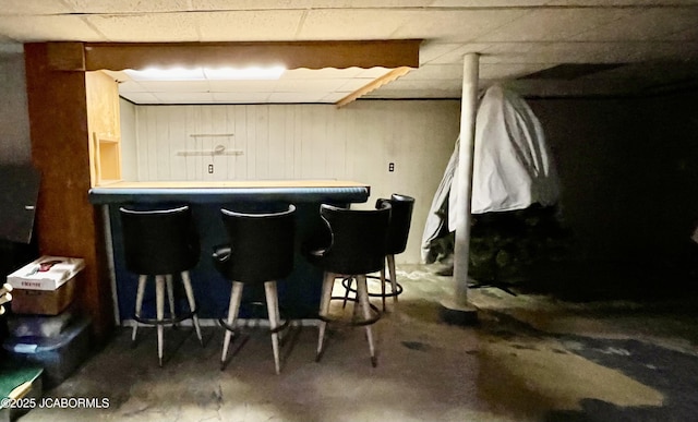 501 W Morgan St, Tipton, MO 65081 - indoor dry bar with a paneled ceiling and concrete flooring