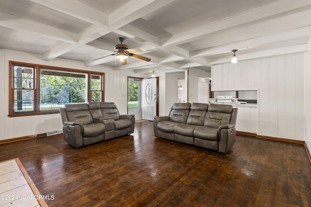 living room with dark hardwood / wood-style floors, beam ceiling, and ceiling fan