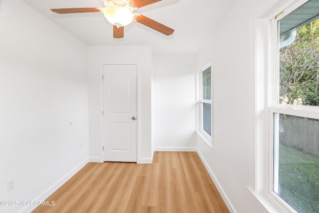 1214 Lynn St, Fulton, MO 65251 - empty room with light wood finished floors and ceiling fan