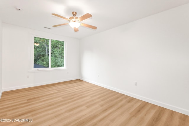 1214 Lynn St, Fulton, MO 65251 - unfurnished room featuring light wood-type flooring, ceiling fan, and a smoke detector