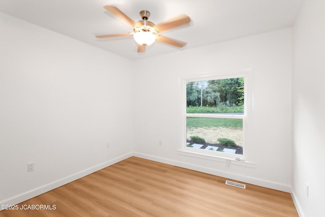 1214 Lynn St, Fulton, MO 65251 - empty room featuring light wood-style floors and ceiling fan