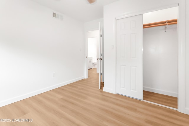 1214 Lynn St, Fulton, MO 65251 - unfurnished bedroom with light wood-type flooring and a closet