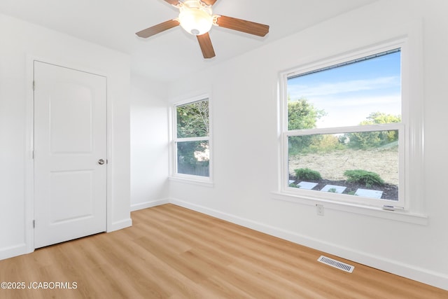 1214 Lynn St, Fulton, MO 65251 - spare room featuring light wood-style floors and a ceiling fan