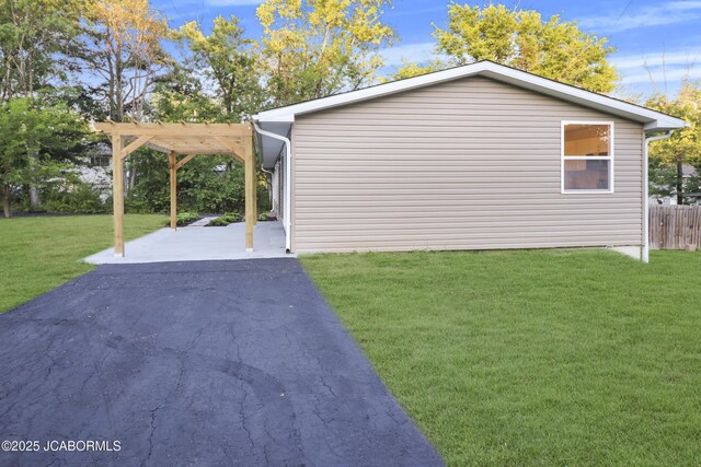 1214 Lynn St, Fulton, MO 65251 - view of property exterior with a pergola and a patio area