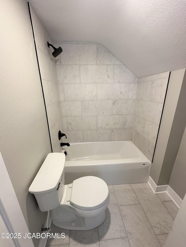 1434 Sunset Lake Rd, Jefferson City, MO 65109 - bathroom with vaulted ceiling, toilet, a textured ceiling, marble finish floor, and baseboards