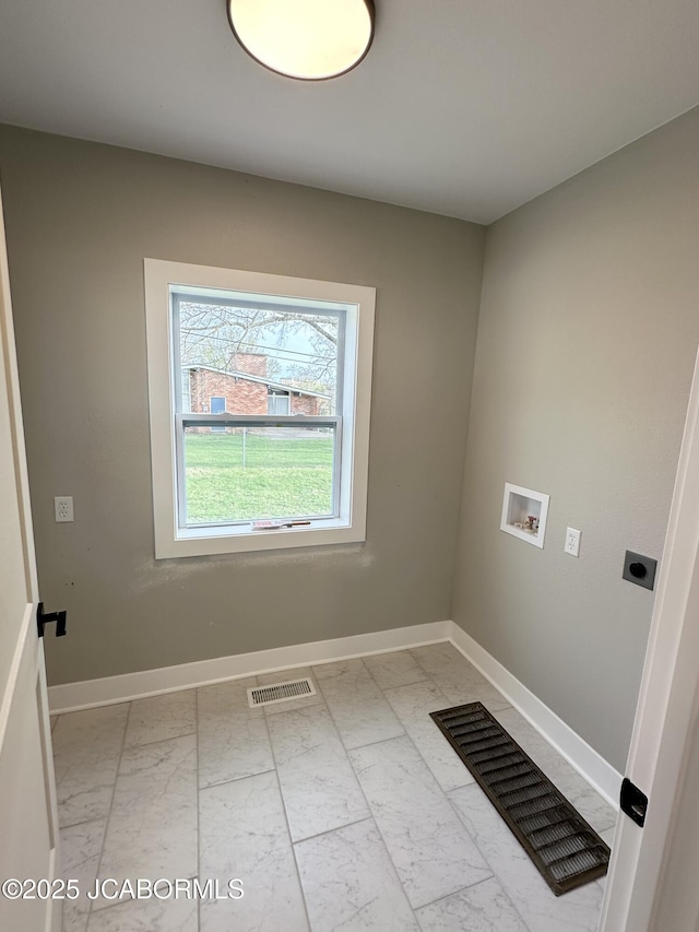 1434 Sunset Lake Rd, Jefferson City, MO 65109 - clothes washing area featuring marble finish floor, baseboards, laundry area, and visible vents