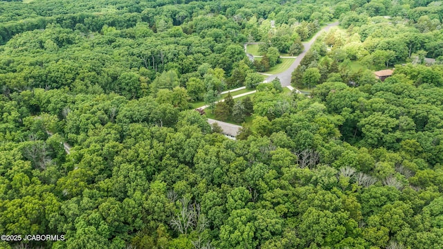 4300 W E Ridge Rd, Columbia, MO 65202 - aerial overview of property's location featuring a heavily wooded area