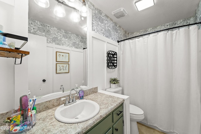 4300 W E Ridge Rd, Columbia, MO 65202 - full bathroom with toilet, vanity, a shower with curtain, and wallpapered walls
