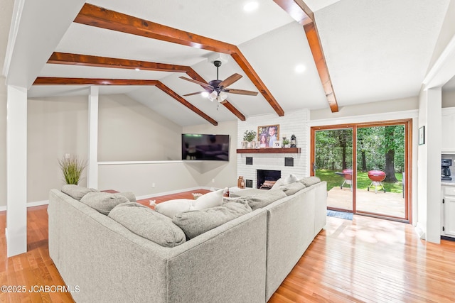 4300 W E Ridge Rd, Columbia, MO 65202 - living area featuring a brick fireplace, light wood-type flooring, baseboards, ceiling fan, and recessed lighting
