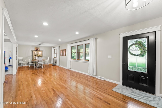 4300 W E Ridge Rd, Columbia, MO 65202 - entryway featuring light wood finished floors, recessed lighting, and baseboards