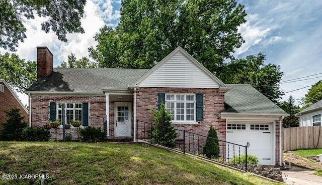 view of front of home featuring a garage and a front lawn