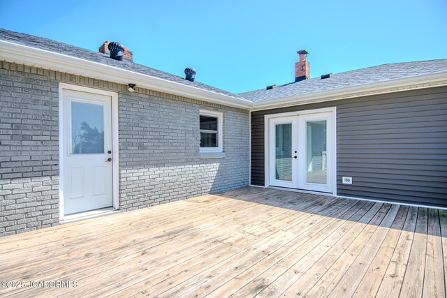 12271 County Road 4037, Holts Summit, MO 65043 - wooden terrace with french doors