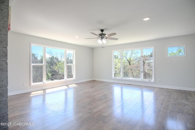 12271 County Road 4037, Holts Summit, MO 65043 - unfurnished room with ceiling fan, baseboards, wood finished floors, and recessed lighting